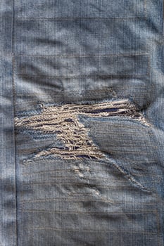 Jeans repairs are artistic. photo