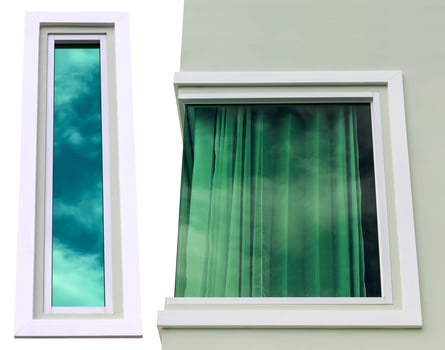solate Concrete windows reflect blue sky. photo
