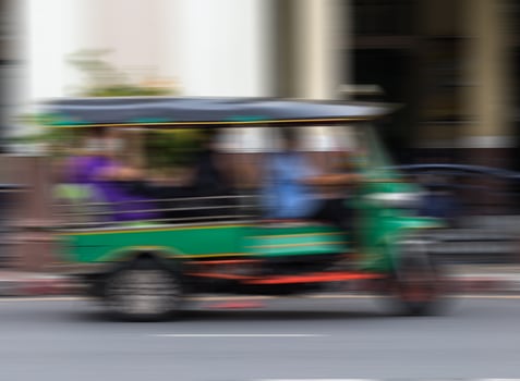 Blurred tuk tuk movement. photo