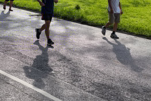 Shadow people running on the street. photo