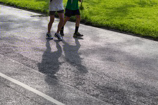 Shadow people running on the street. photo