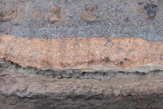 Gravel under the eroded road. photo