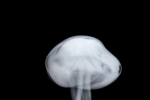 A lonely and curious smoke alien visiting our planet photo
