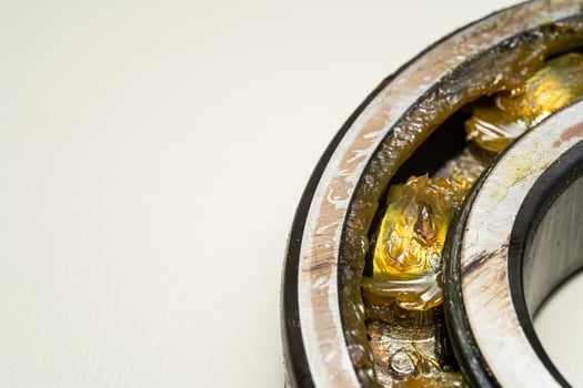 old bearing car.expire bearing car isoleted on white background. old rusty ball bearing photo