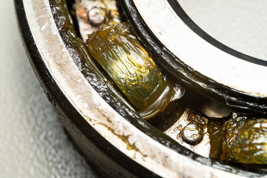 old bearing car.expire bearing car isoleted on white background. old rusty ball bearing photo