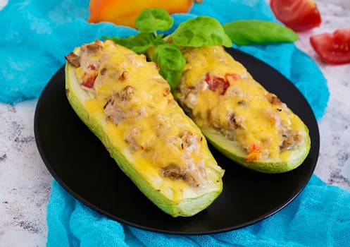 Stuffed zucchini with chicken and vegetables photo