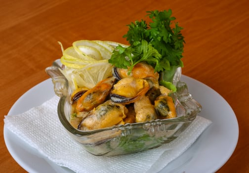 Mussels in butter sauce photo