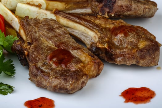 Lamb chops on the plate photo