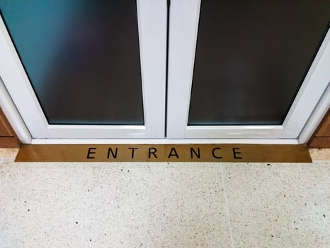 Entrance label on the floor photo