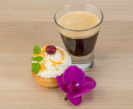 Cupcake on wooden background photo