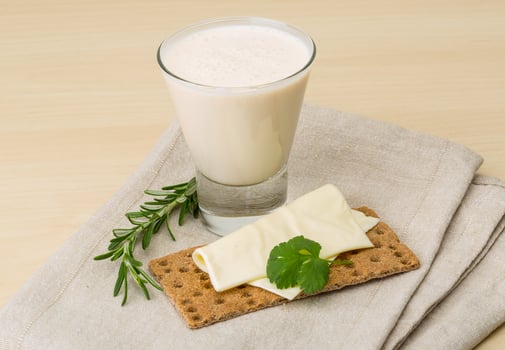 Kefir on wooden background photo