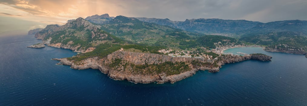 Aerial view of the luxury cliff house hotel on top of the cliff on the island of Mallorca. photo