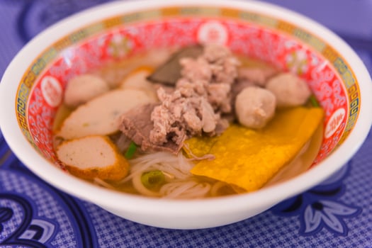 Thai soup in a bowl photo