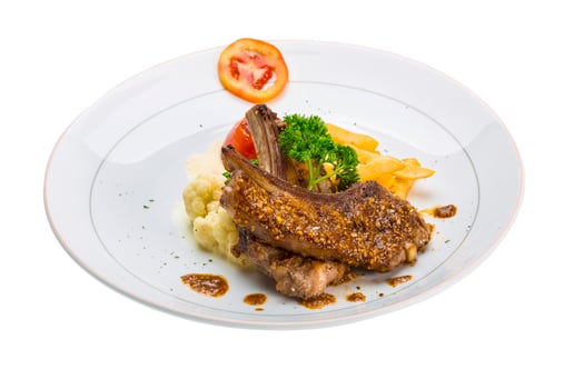 Lamb chops on the plate and white background photo