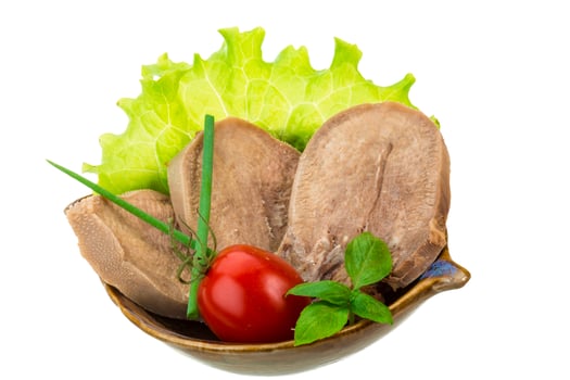 Beef tongue on white photo
