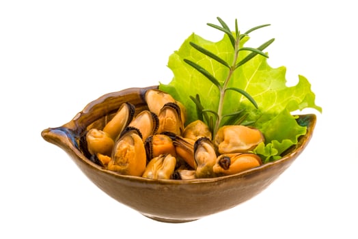 Marinated mussels in a bowl on white background photo