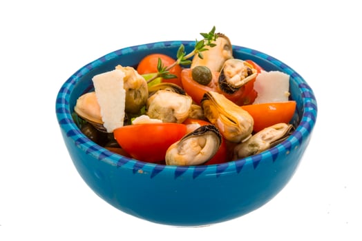 Mussells salad in a bowl on white background photo