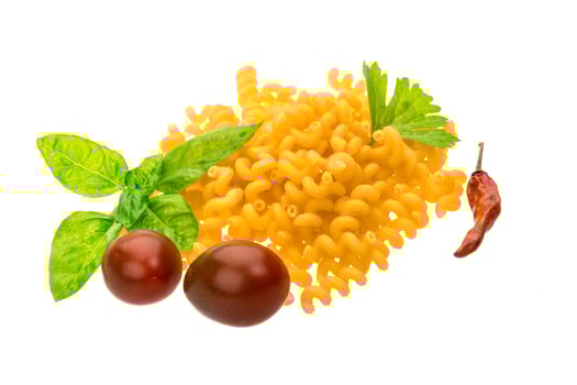 Raw macaroni on white background photo