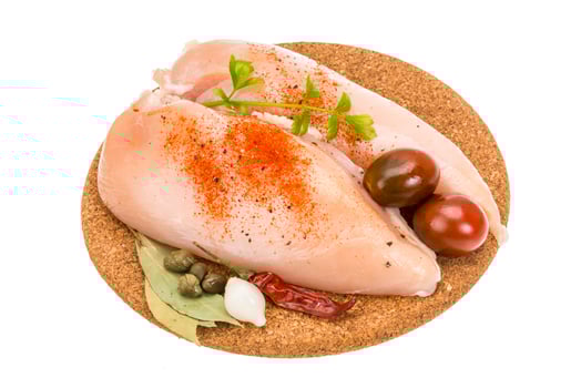 Chicken breast on white photo