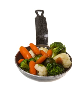 mixed vegetables with fresh sprout in pan photo