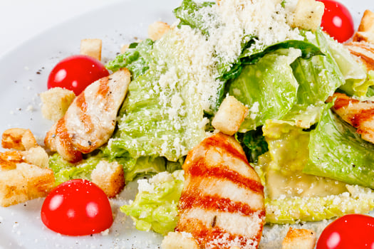 Caesar Salad on white photo