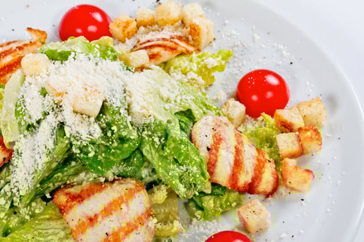 Caesar Salad on white photo