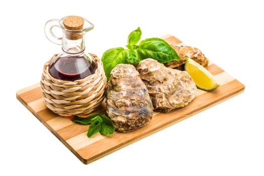 Fresh oyster on white photo