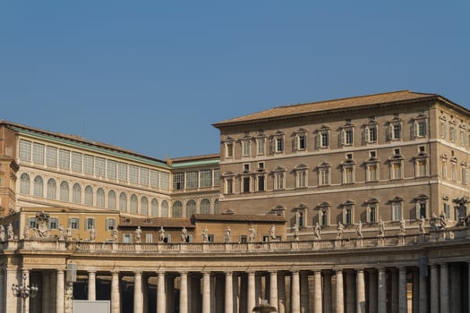 Buildings in Vatican, the Holy See within Rome, Italy. Part of Saint Peter's Basilica. photo