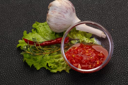 Spicy tomato and garlic sauce photo