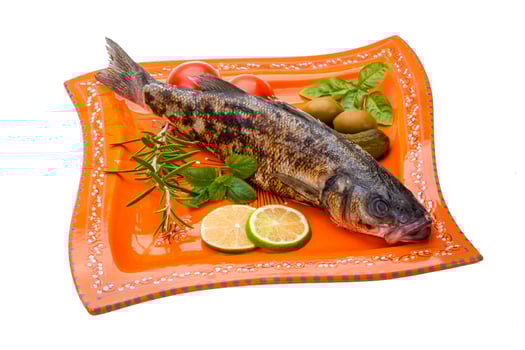 Roasted seabass on white photo