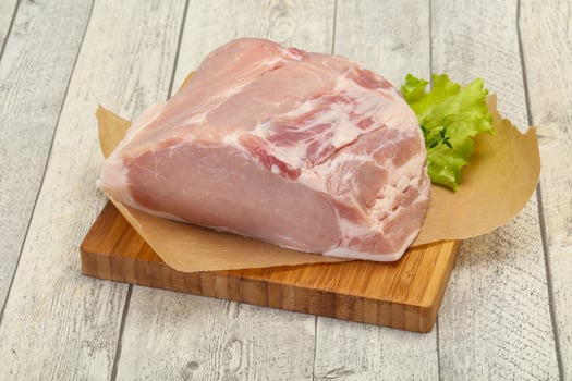 Raw pork meat piece for cooking photo