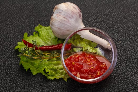 Spicy tomato and garlic sauce photo