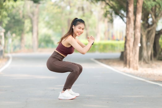 Beautiful Asian women exercise in the park every morning, It is a lifestyle for relaxation and good health of the body photo
