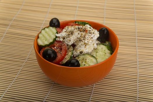 Greek salad on wood photo