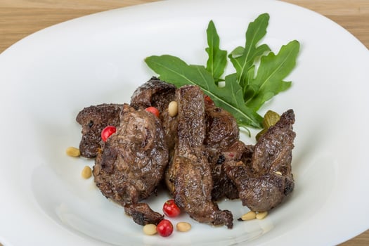 Roasted venison on wood photo
