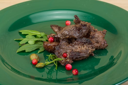 Roasted venison on wood photo