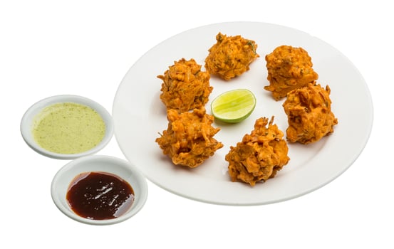 Onion bhajee on white photo