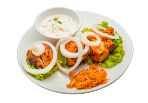 Chicken Tikka on white photo