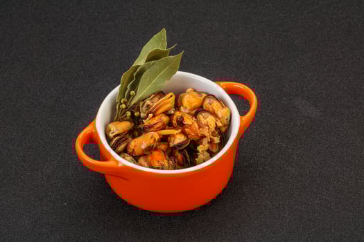 Pickled mussels in the bowl photo