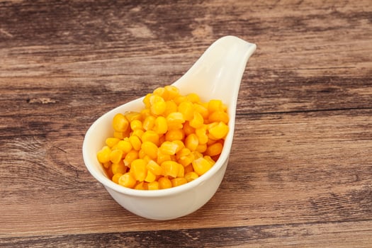 Sweet corn seeds in the bowl photo