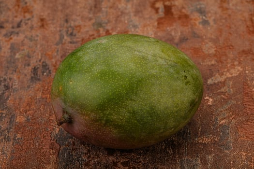 Tropical fruit - Green sweet mango photo