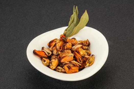 Pickled mussels in the bowl photo