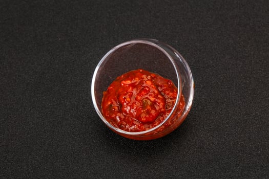 Tomato spicy sauce in the bowl photo