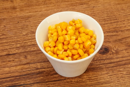 Sweet corn seeds in the bowl photo
