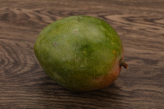 Tropical fruit - Green sweet mango photo