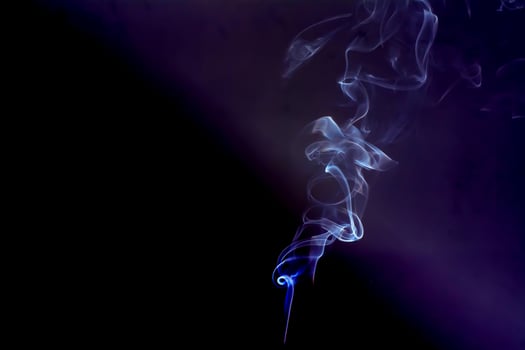 The smoke is colorful. It is abstract. photo