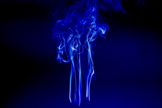 The smoke is colorful. It is abstract. photo