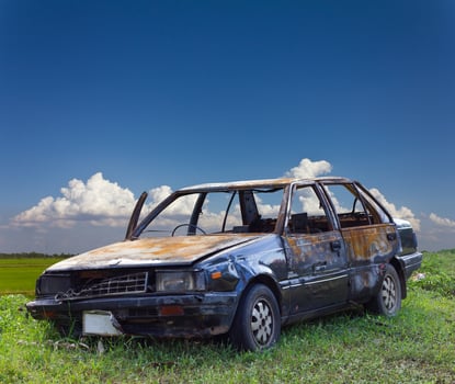 Burnt car in rural Thailand. photo
