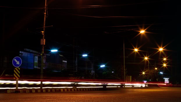 Car headlights and night street lamps. photo