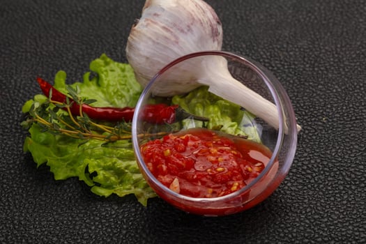 Spicy tomato and garlic sauce photo